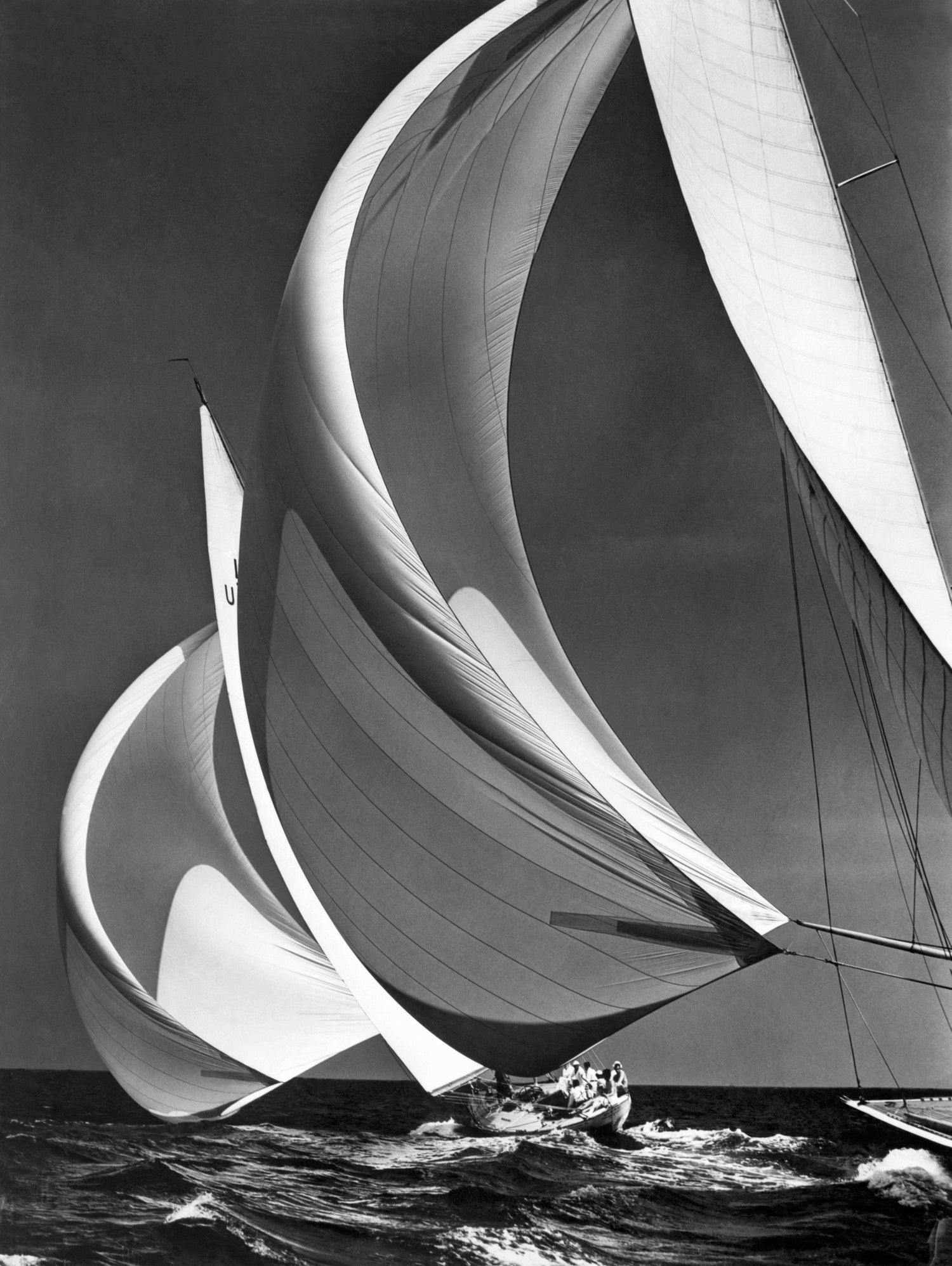 Two sailboats racing with their spinakers on a reach, 1940s by Bridgeman Images on GIANT ART - black and white photography