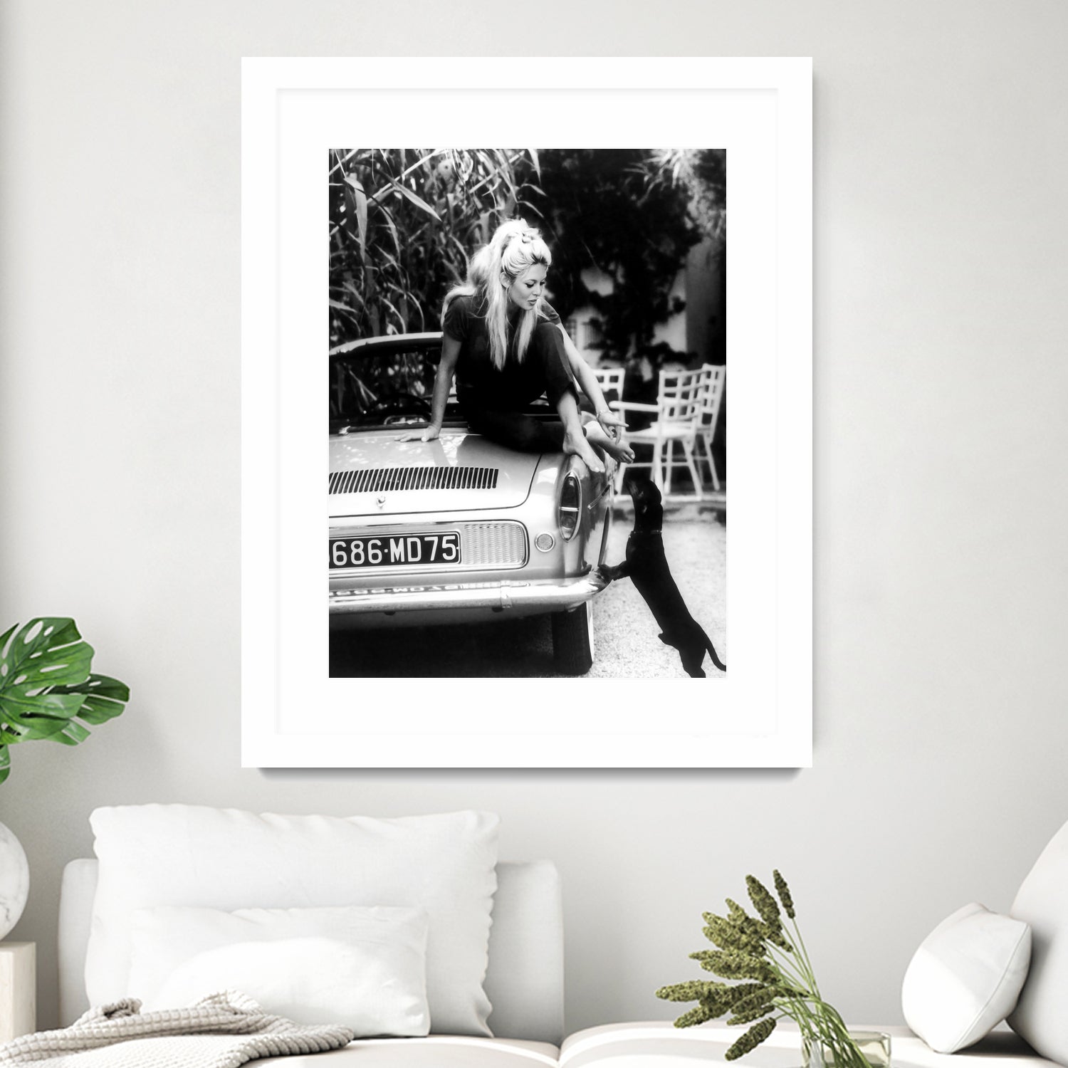 Brigitte Bardot with her dog in St. Tropez, 1962 - Art Print by M