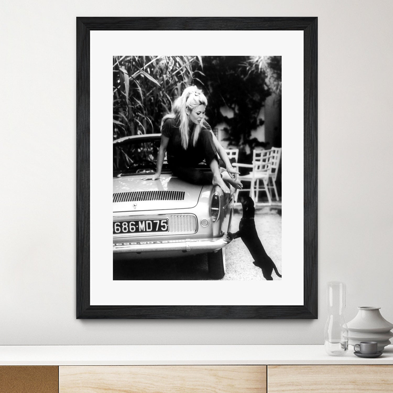 Brigitte Bardot with her dog in St. Tropez, 1962 - Art Print by M