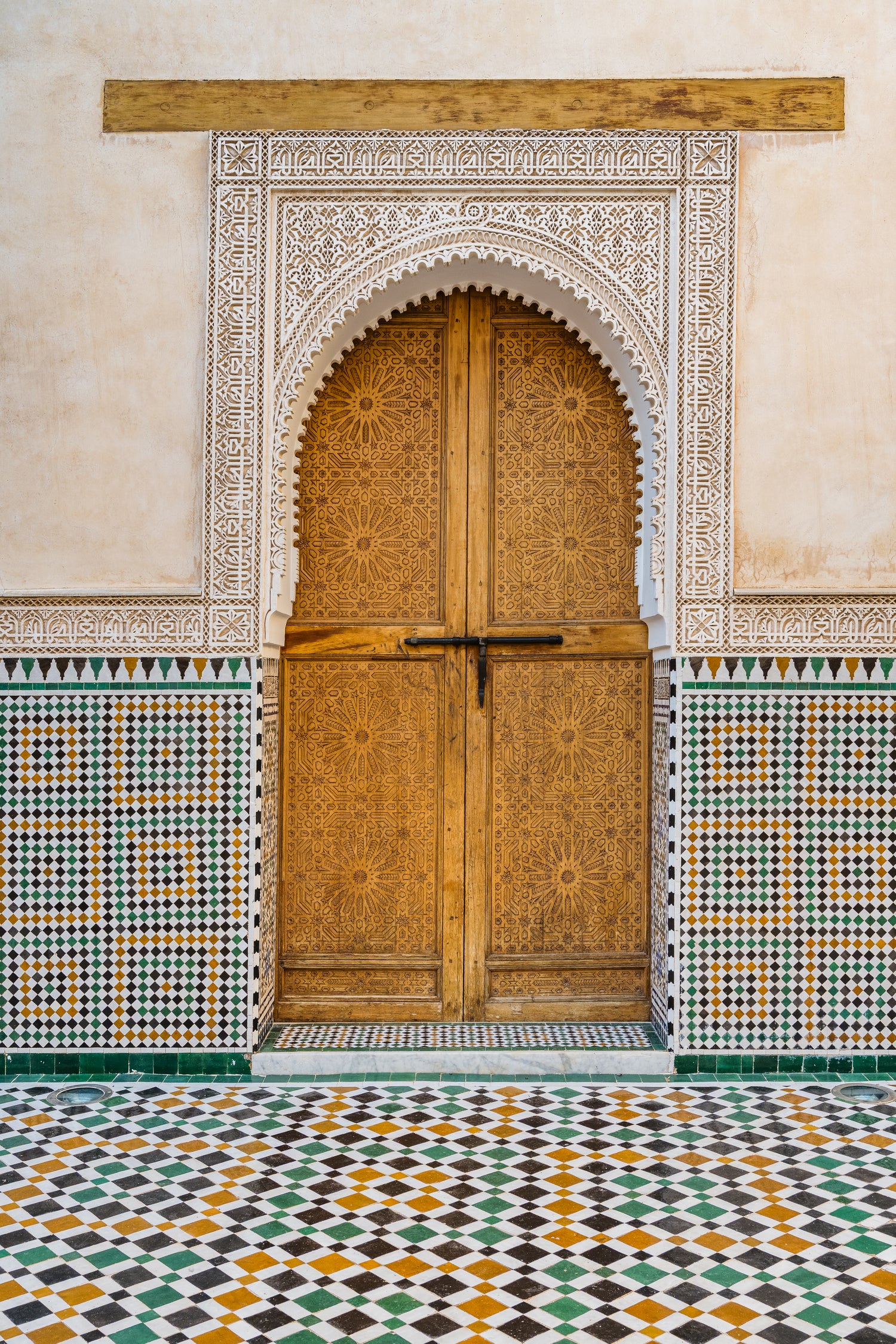 Decorated brown wooden door in Morocco - Art Print by Photolovers