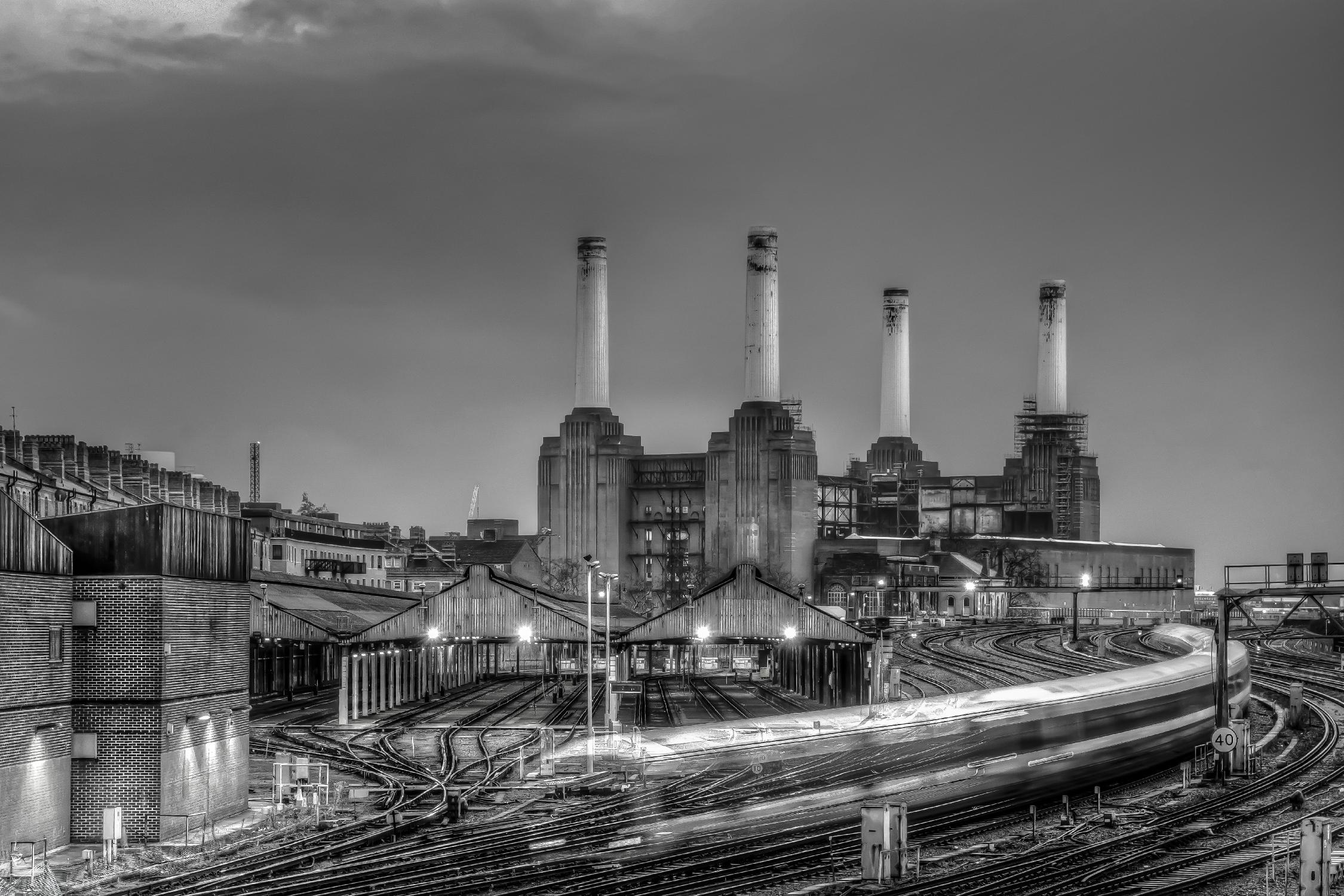 Trains pass Battersea Power Sation by Nick Jackson on GIANT ART - white city scene